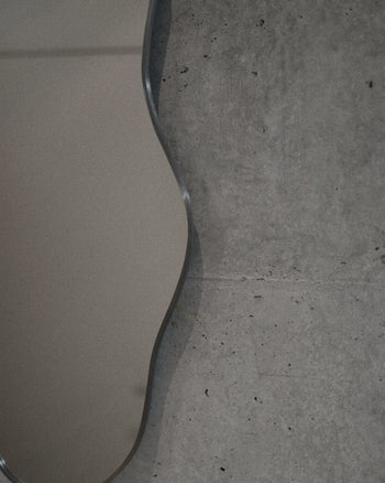 IRREGULAR WAVE MIRROR